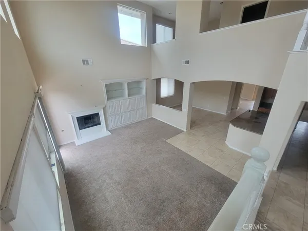 a view of a livingroom with wooden floor
