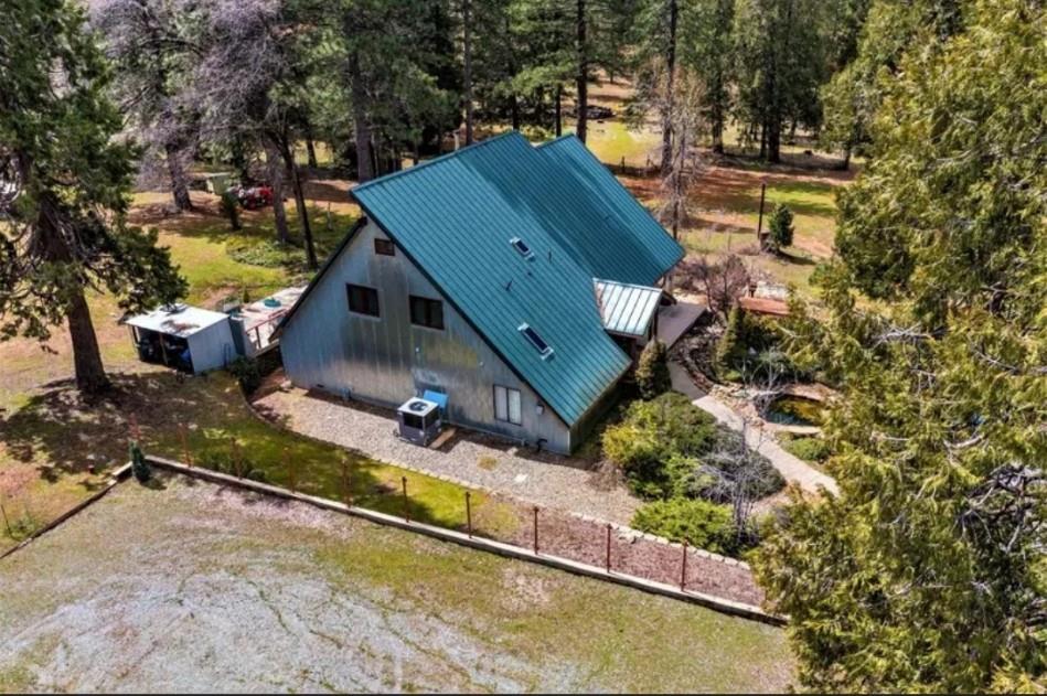 19500 Jesus Maria Road Mokelumne Hill, CA 95245 - Photo 1 of 92 an aerial view of a house with a yard basket ball court and outdoor seating