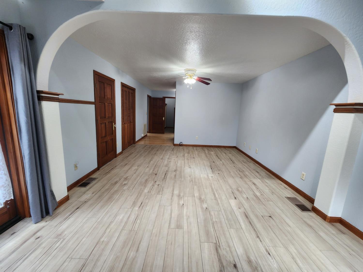 19500 Jesus Maria Road Mokelumne Hill, CA 95245 - Photo 20 of 92 a view of empty room with wooden floor