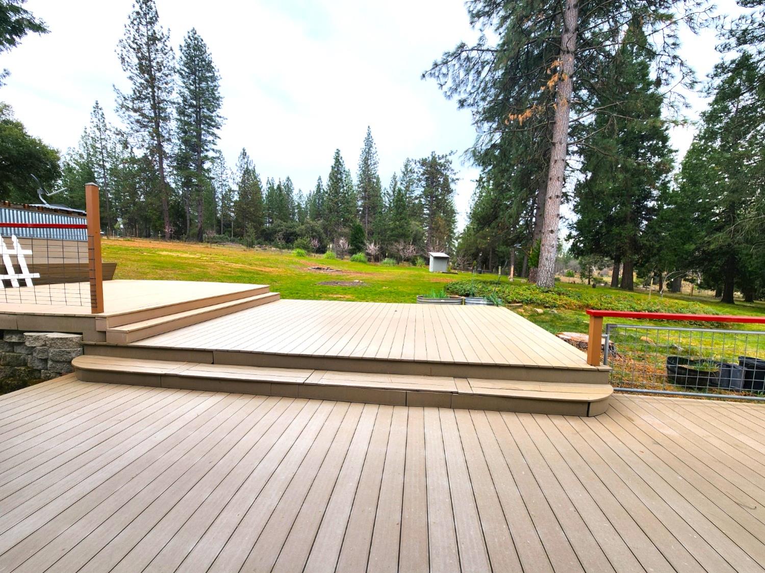 19500 Jesus Maria Road Mokelumne Hill, CA 95245 - Photo 47 of 92 a view of outdoor space with swimming pool and trees in the background