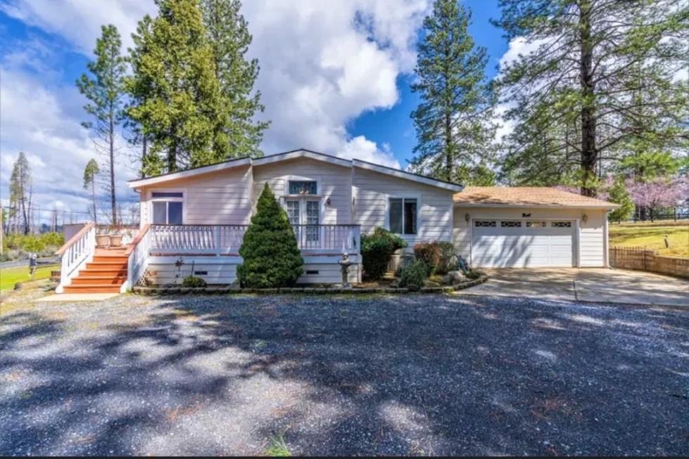 19500 Jesus Maria Road Mokelumne Hill, CA 95245 - Photo 66 of 92 a view of a house with backyard and sitting area