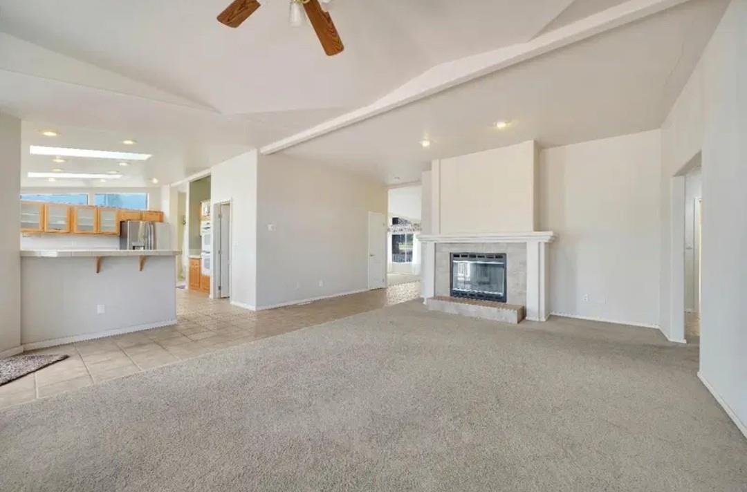 19500 Jesus Maria Road Mokelumne Hill, CA 95245 - Photo 69 of 92 a view of empty room with kitchen and fireplace