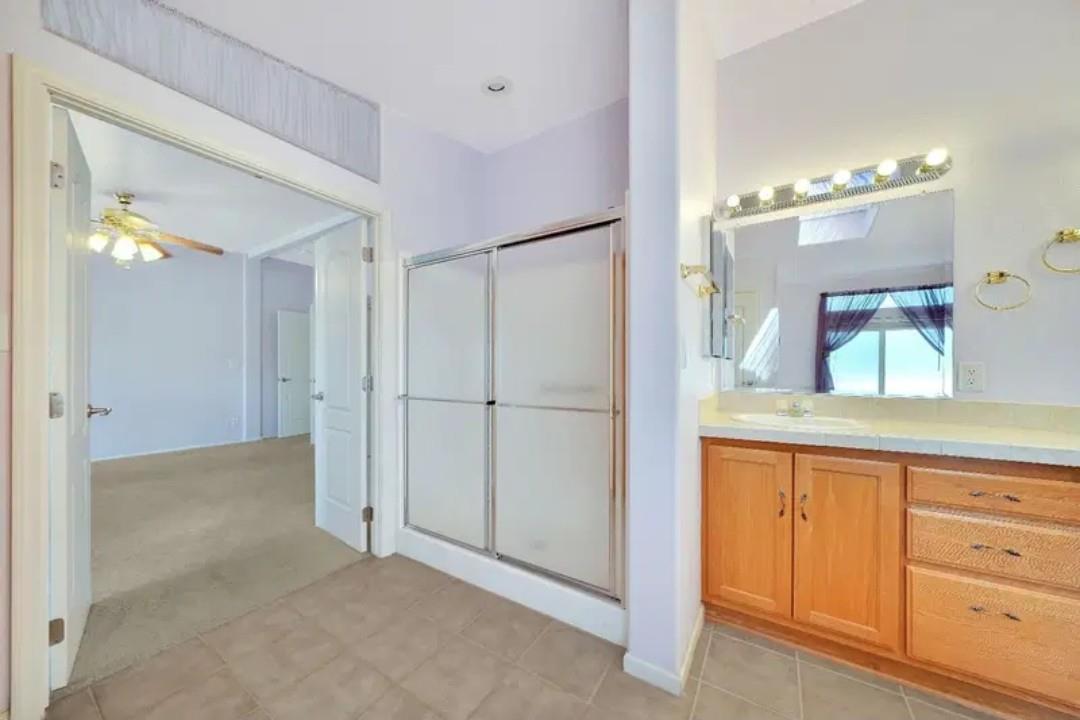 19500 Jesus Maria Road Mokelumne Hill, CA 95245 - Photo 85 of 92 a view of a bathroom with double vanity and a mirror