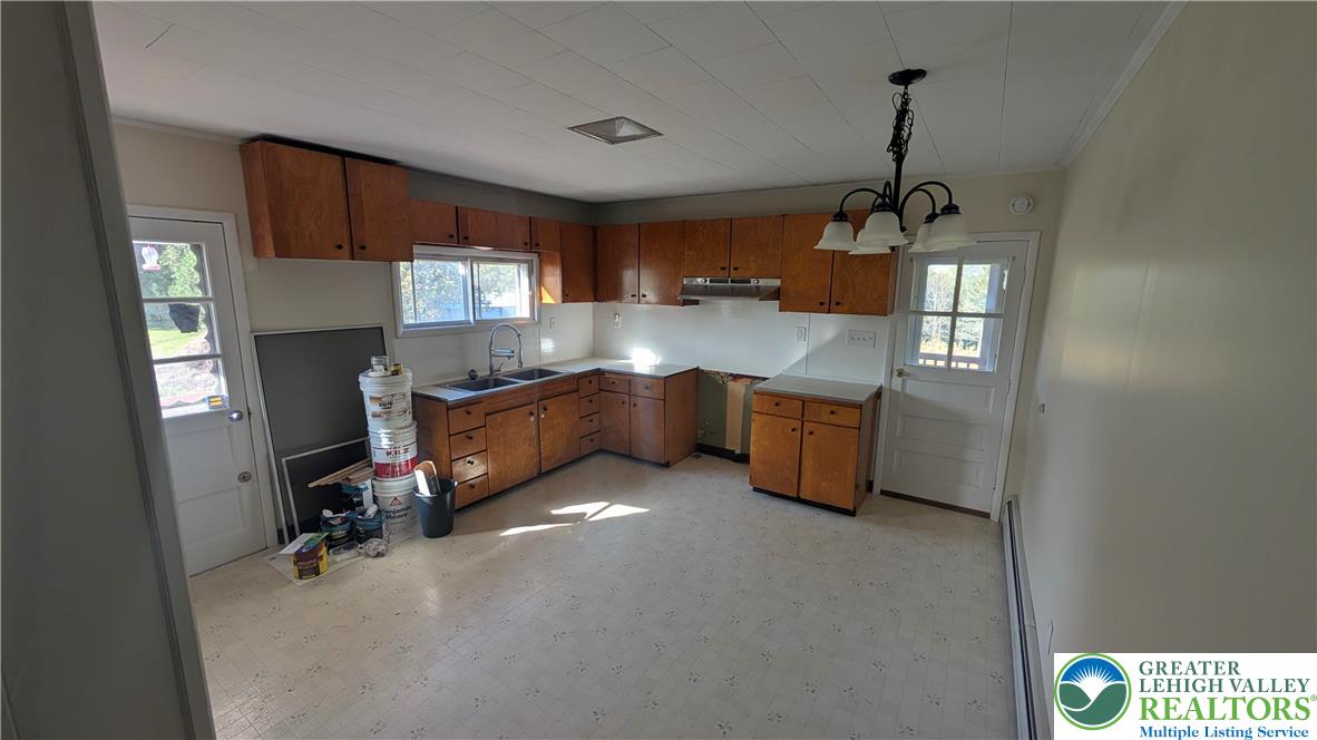 487 Club Road Bath, PA 18014 - Photo 18 of 22 a kitchen with cabinets and window