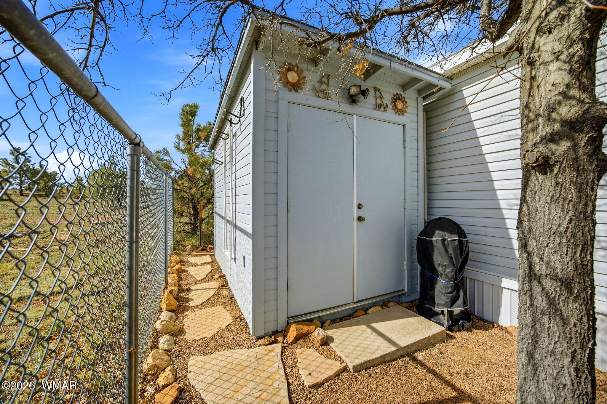 2275 Old Crooks Trail Overgaard, AZ 85933 - Photo 21 of 24 a view of a door and chair