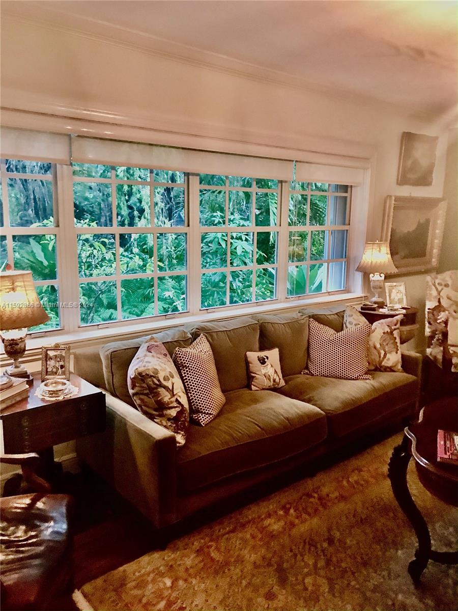 8420 Southwest 70th Street Miami, FL 33143 - Photo 4 of 20 a living room with furniture and a large window