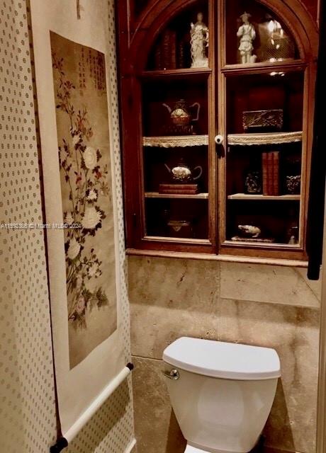 8420 Southwest 70th Street Miami, FL 33143 - Photo 8 of 20 a bathroom with a toilet and shower