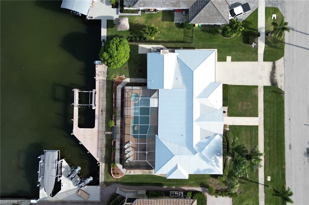 562 Goldcoast Court Marco Island, FL 34145 - Photo 3 of 28 an aerial view of houses with yard