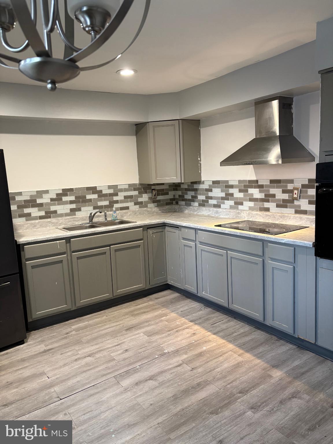 11 Ridgewood Place Willingboro, NJ 08046 - Photo 6 of 14 a kitchen with stainless steel appliances granite countertop a sink stove and refrigerator