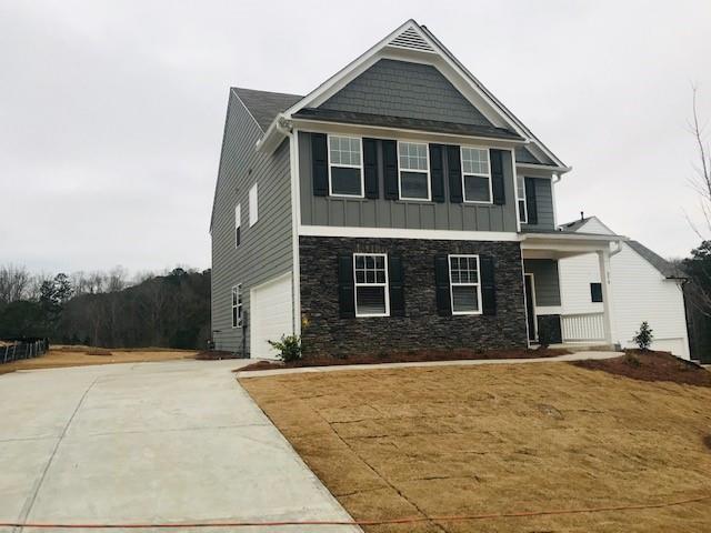 Photo is same PLAN-Not actual home. Same ELEVATION & level of STONE.