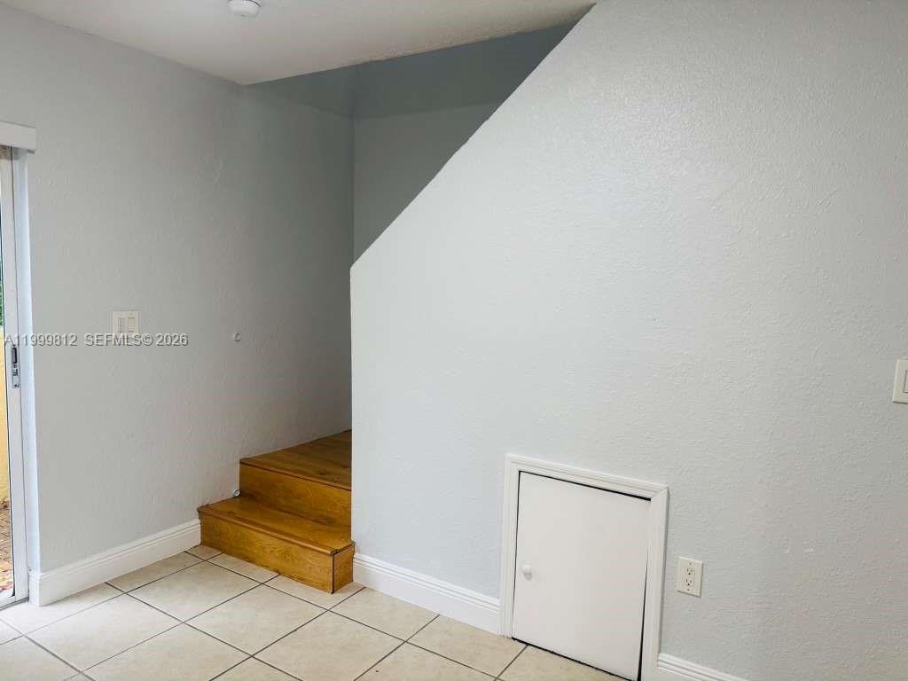 8270 Southwest 149th Court, Unit 10209 Miami, FL 33193 - Photo 11 of 32 a view of small space with wooden floor