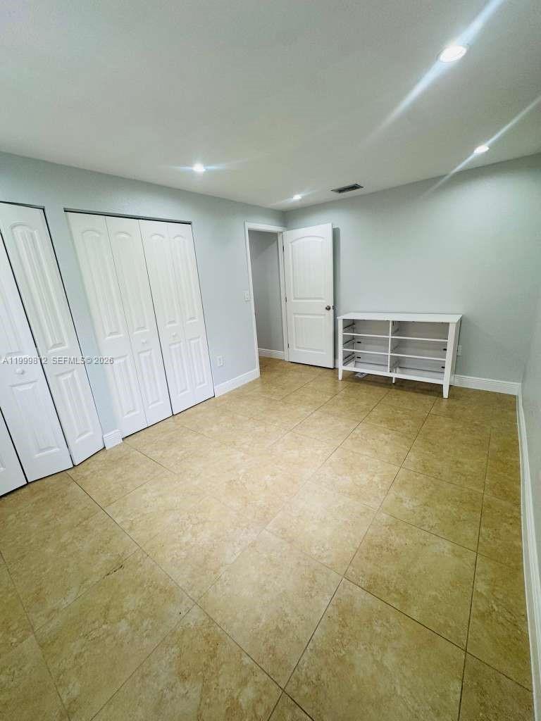 8270 Southwest 149th Court, Unit 10209 Miami, FL 33193 - Photo 19 of 32 a view of an empty room