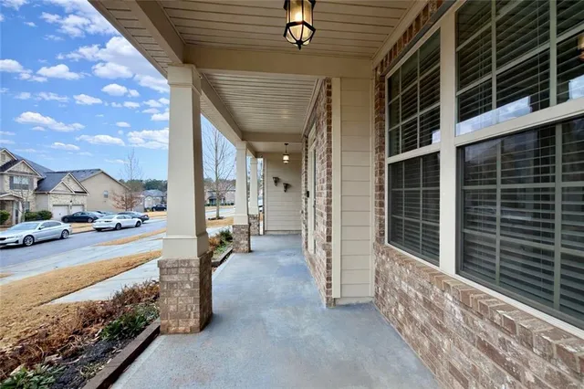 a view of a porch with a bench