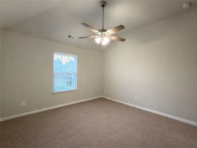 a house with trees in front of it