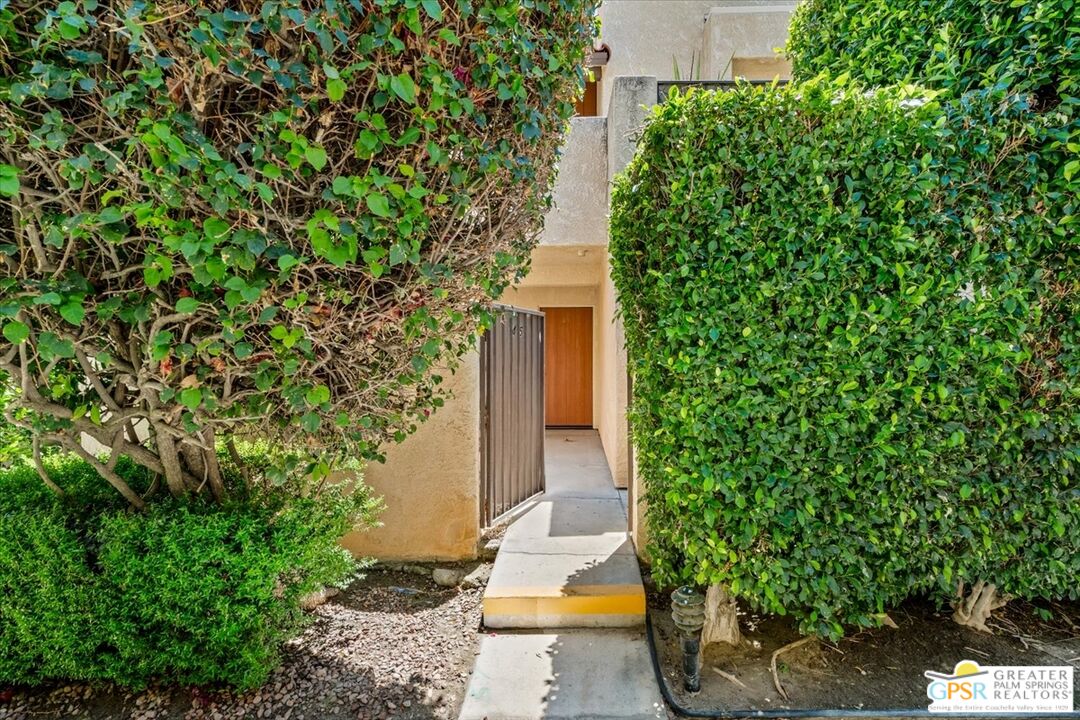200 East Racquet Club Road, Unit 45 Palm Springs, CA 92262 - Photo 3 of 36 a view of an entrance of the house
