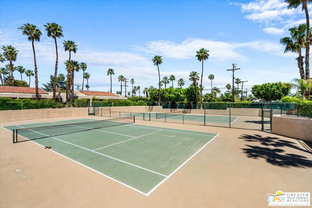 200 East Racquet Club Road, Unit 45 Palm Springs, CA 92262 - Photo 33 of 36 a view of a tennis court