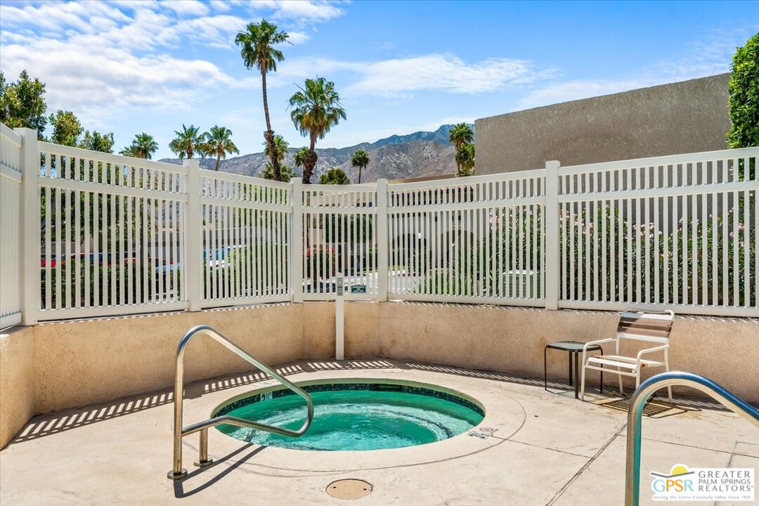 200 East Racquet Club Road, Unit 45 Palm Springs, CA 92262 - Photo 34 of 36 a view of a chair and table in the balcony