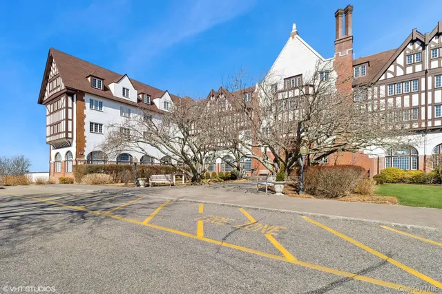 front view of a building with a yard