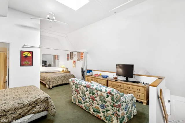 a bedroom with a bed and a table in it