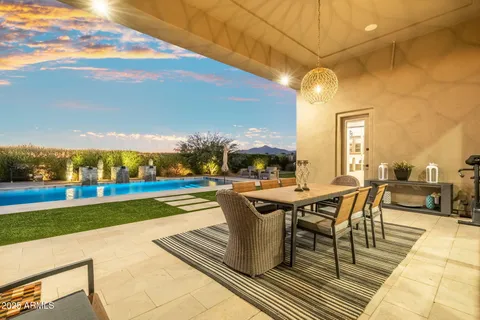 a view of a living room with a swimming pool