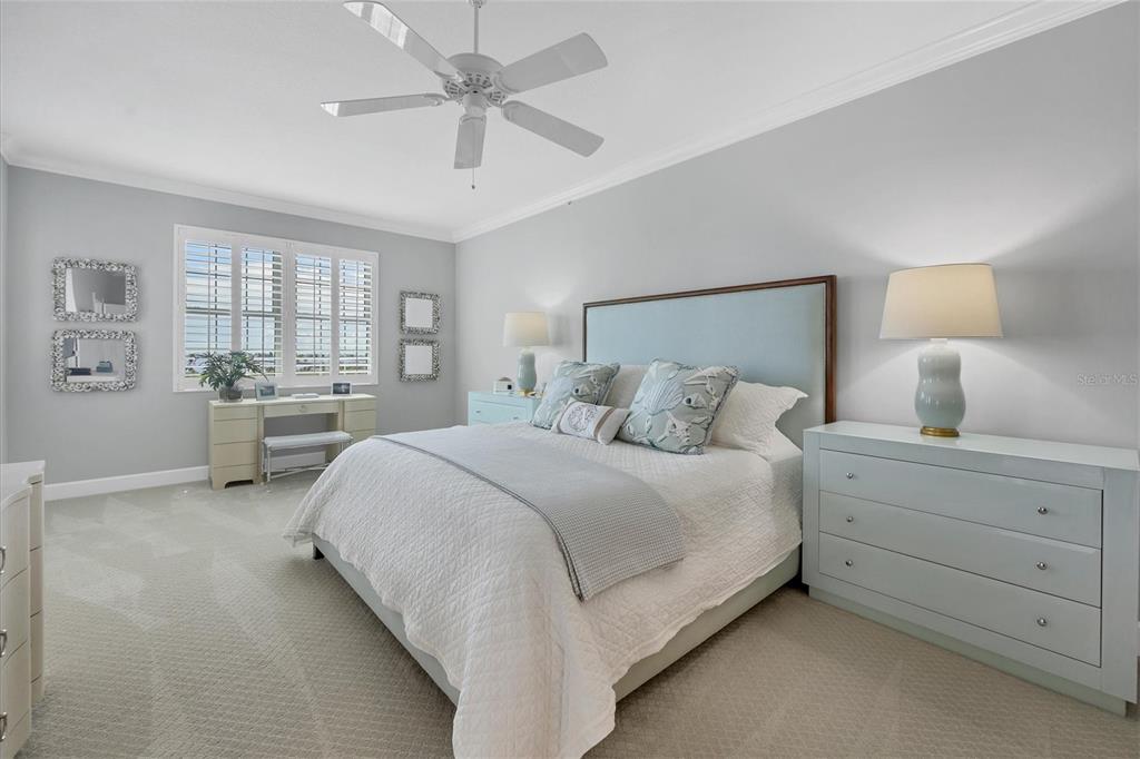 13213 Gasparilla Road, Unit B601 Placida, FL 33946 - Photo 16 of 36 a spacious bedroom with a bed and window