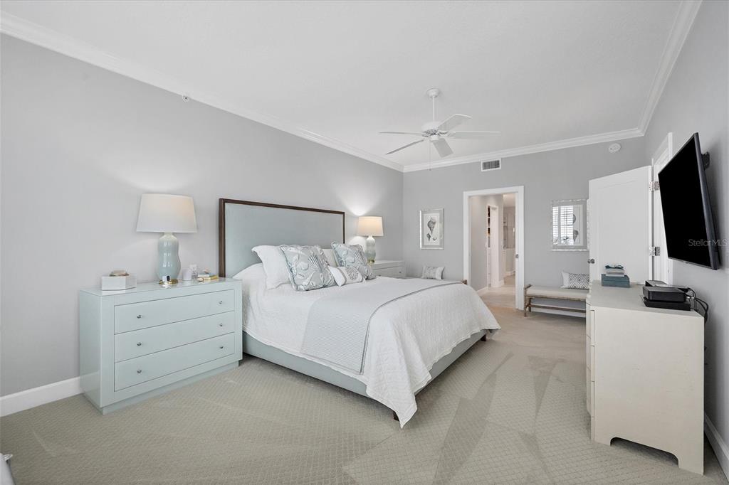 13213 Gasparilla Road, Unit B601 Placida, FL 33946 - Photo 17 of 36 a bedroom with bed tv and flat screen tv