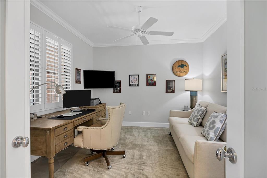 13213 Gasparilla Road, Unit B601 Placida, FL 33946 - Photo 25 of 36 a living room with furniture and a flat screen tv