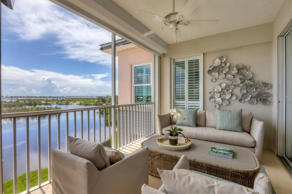 13213 Gasparilla Road, Unit B601 Placida, FL 33946 - Photo 28 of 36 a living room with furniture and a large window