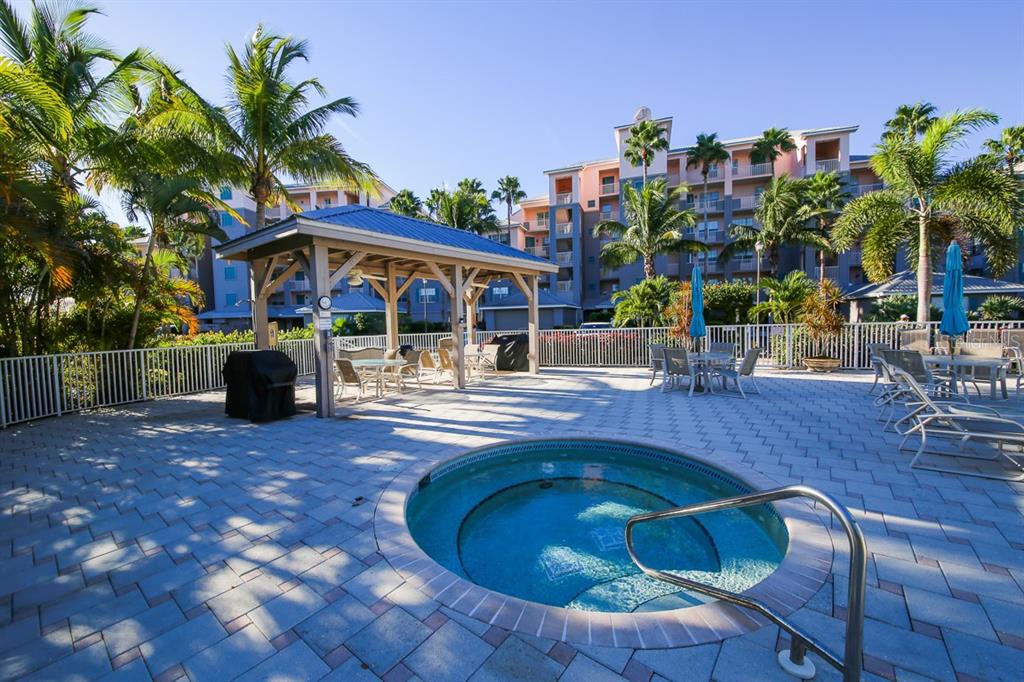 13213 Gasparilla Road, Unit B601 Placida, FL 33946 - Photo 35 of 36 a view of a swimming pool with a patio