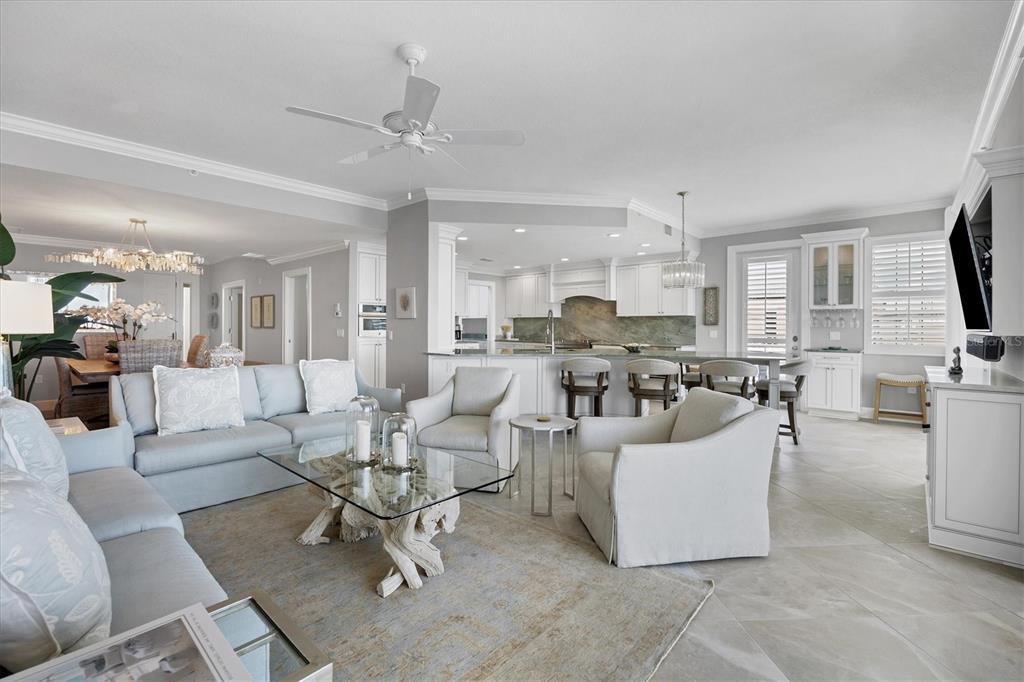 13213 Gasparilla Road, Unit B601 Placida, FL 33946 - Photo 5 of 36 a living room with fireplace furniture and a flat screen tv