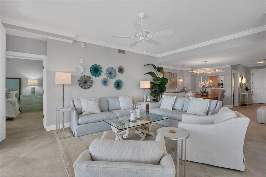 13213 Gasparilla Road, Unit B601 Placida, FL 33946 - Photo 8 of 36 a living room with furniture and a large mirror