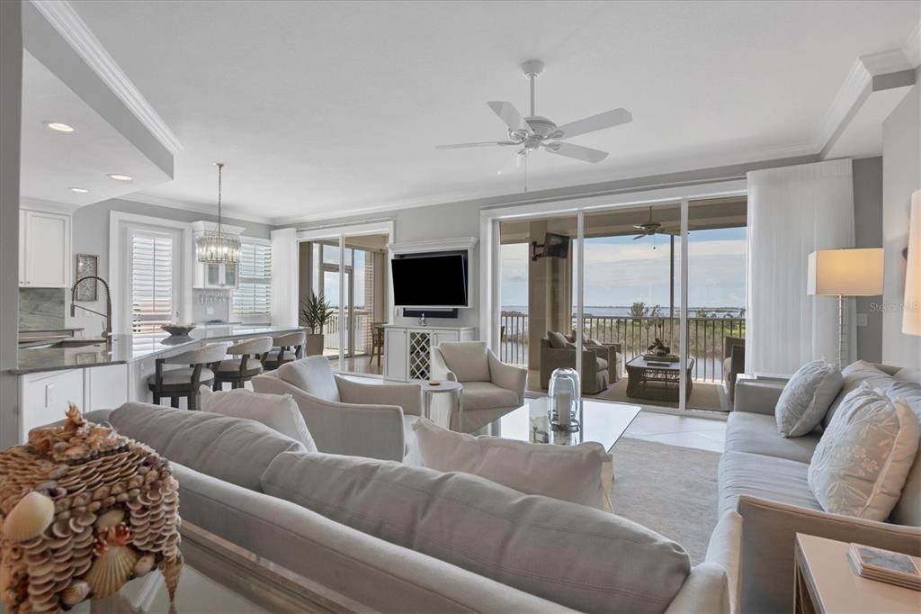 13213 Gasparilla Road, Unit B601 Placida, FL 33946 - Photo 9 of 36 a living room with furniture and a large window