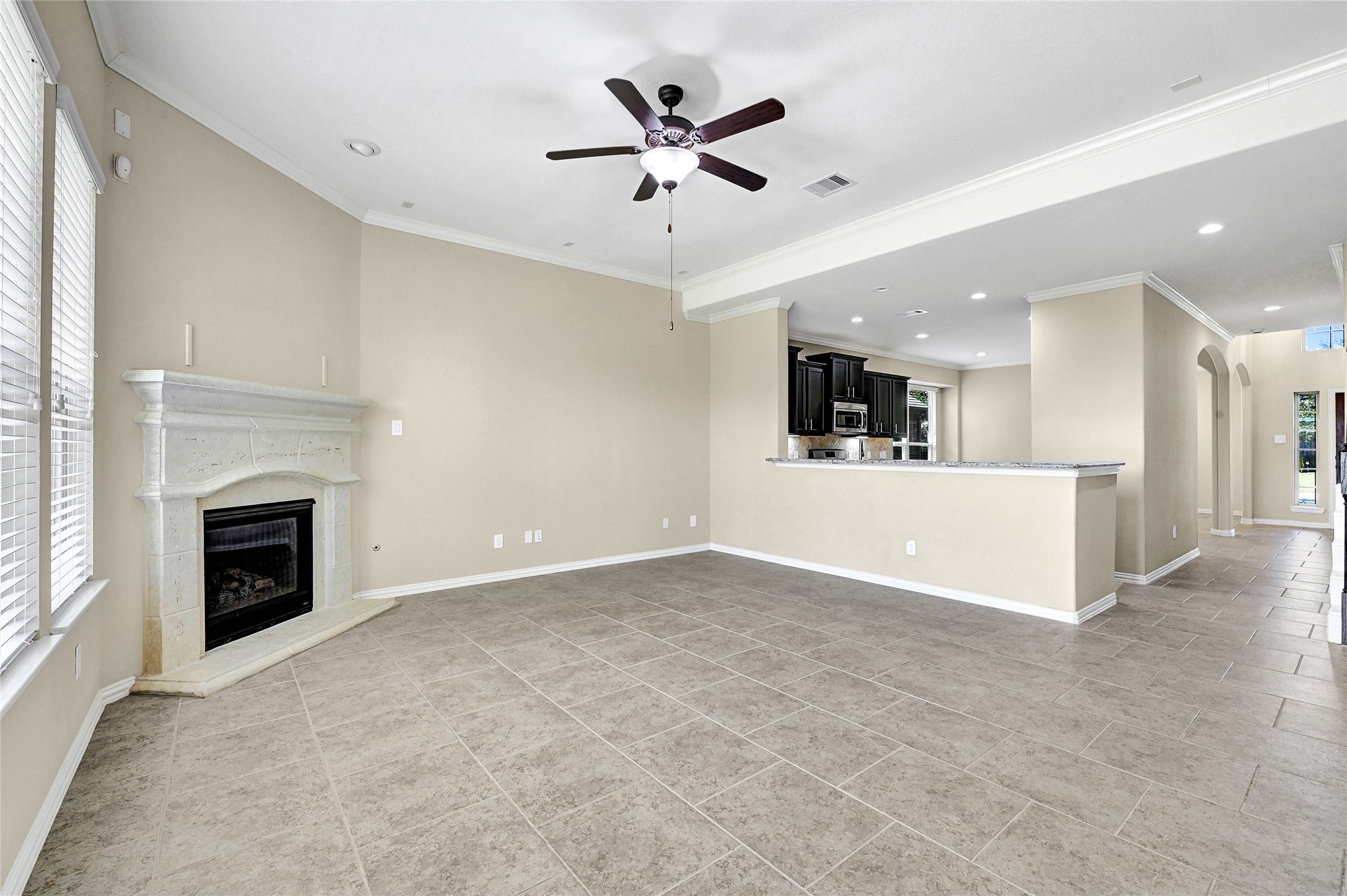 31796 Chapel Rock Lane Spring, TX 77386 - Photo 12 of 30 a view of a livingroom with a kitchen