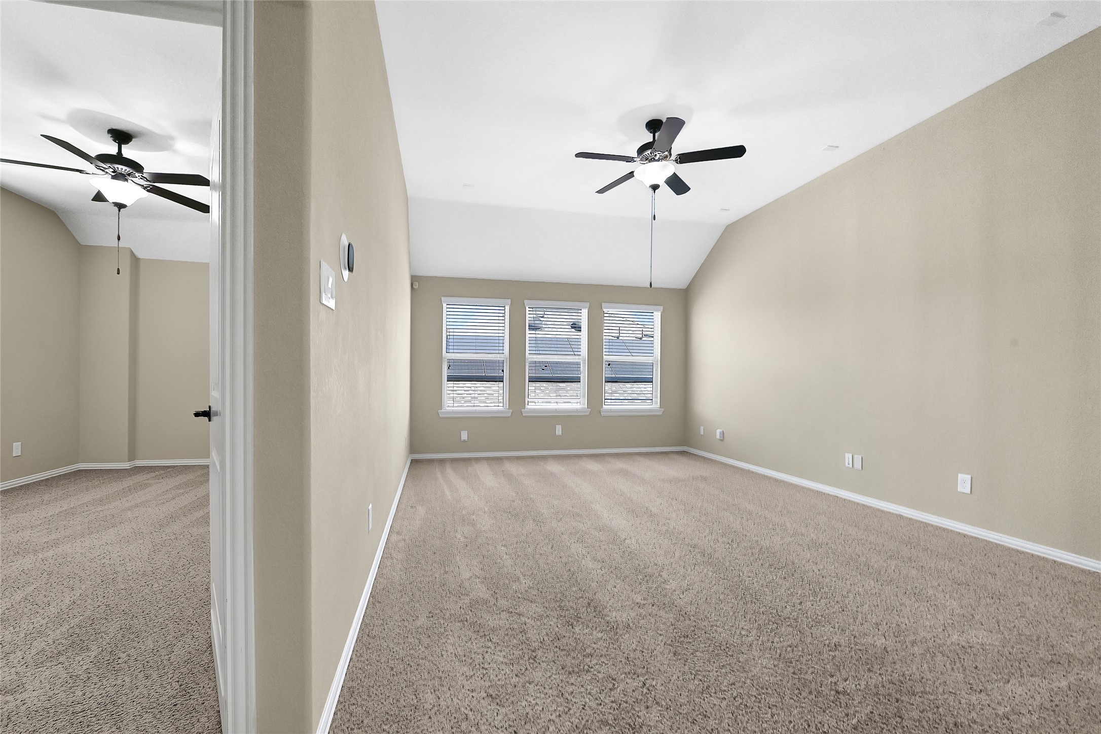 31796 Chapel Rock Lane Spring, TX 77386 - Photo 21 of 30 a view of a big room with windows and chandelier fan