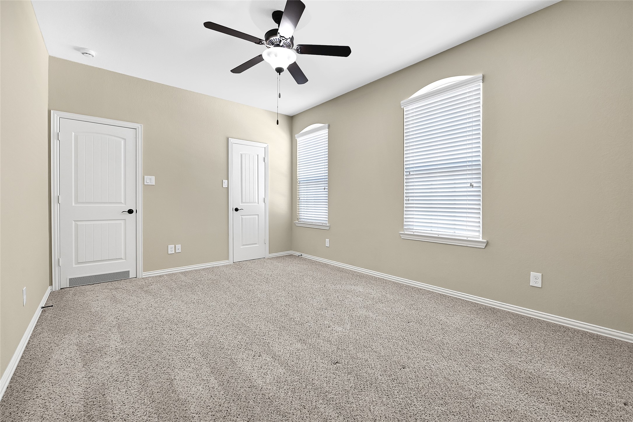 31796 Chapel Rock Lane Spring, TX 77386 - Photo 24 of 30 an empty room with windows and fan