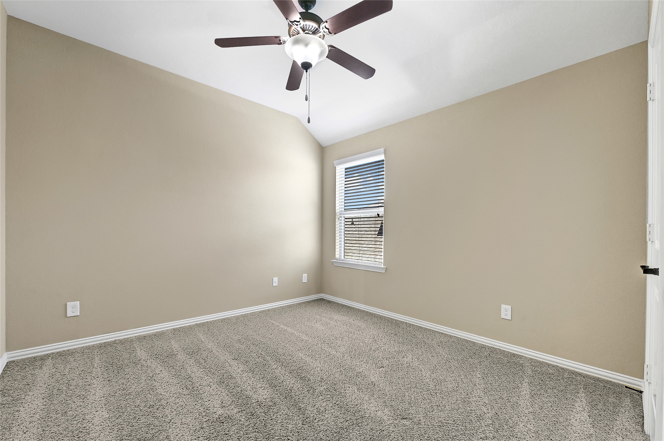 31796 Chapel Rock Lane Spring, TX 77386 - Photo 26 of 30 an empty room with windows and fan