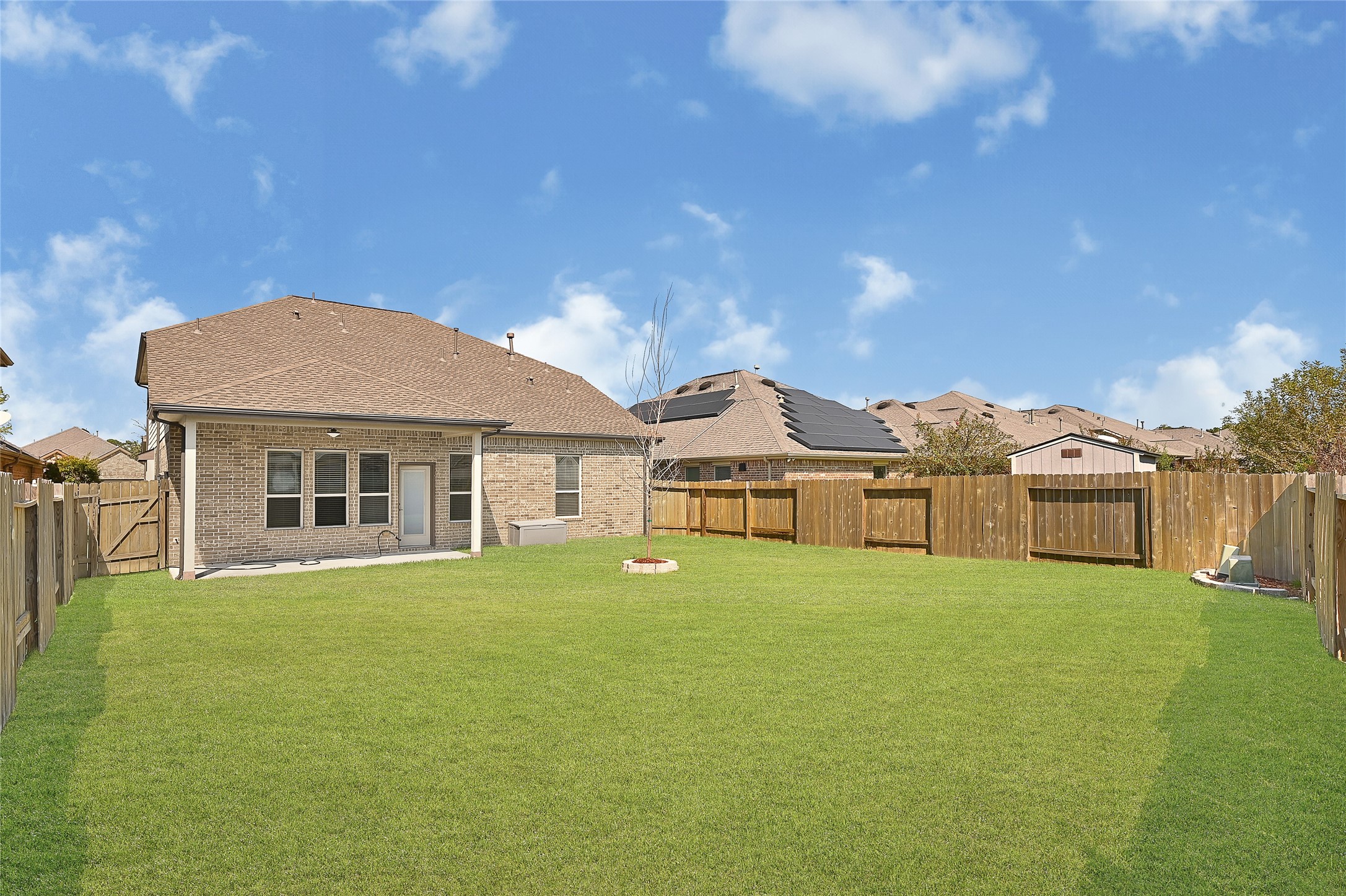 31796 Chapel Rock Lane Spring, TX 77386 - Photo 30 of 30 a view of a house with a yard and sitting area