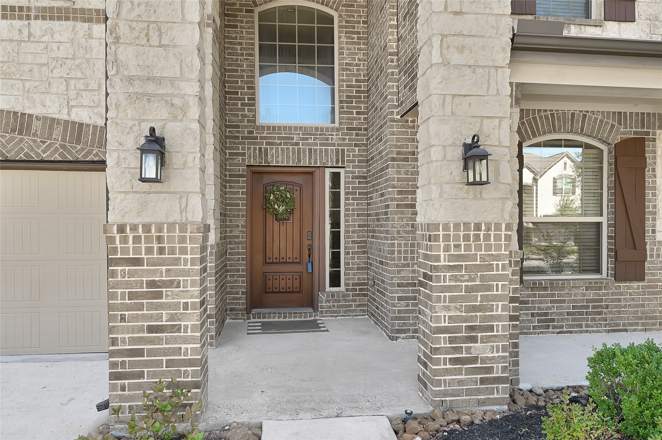 31796 Chapel Rock Lane Spring, TX 77386 - Photo 3 of 30 a front view of a house with a brick wall