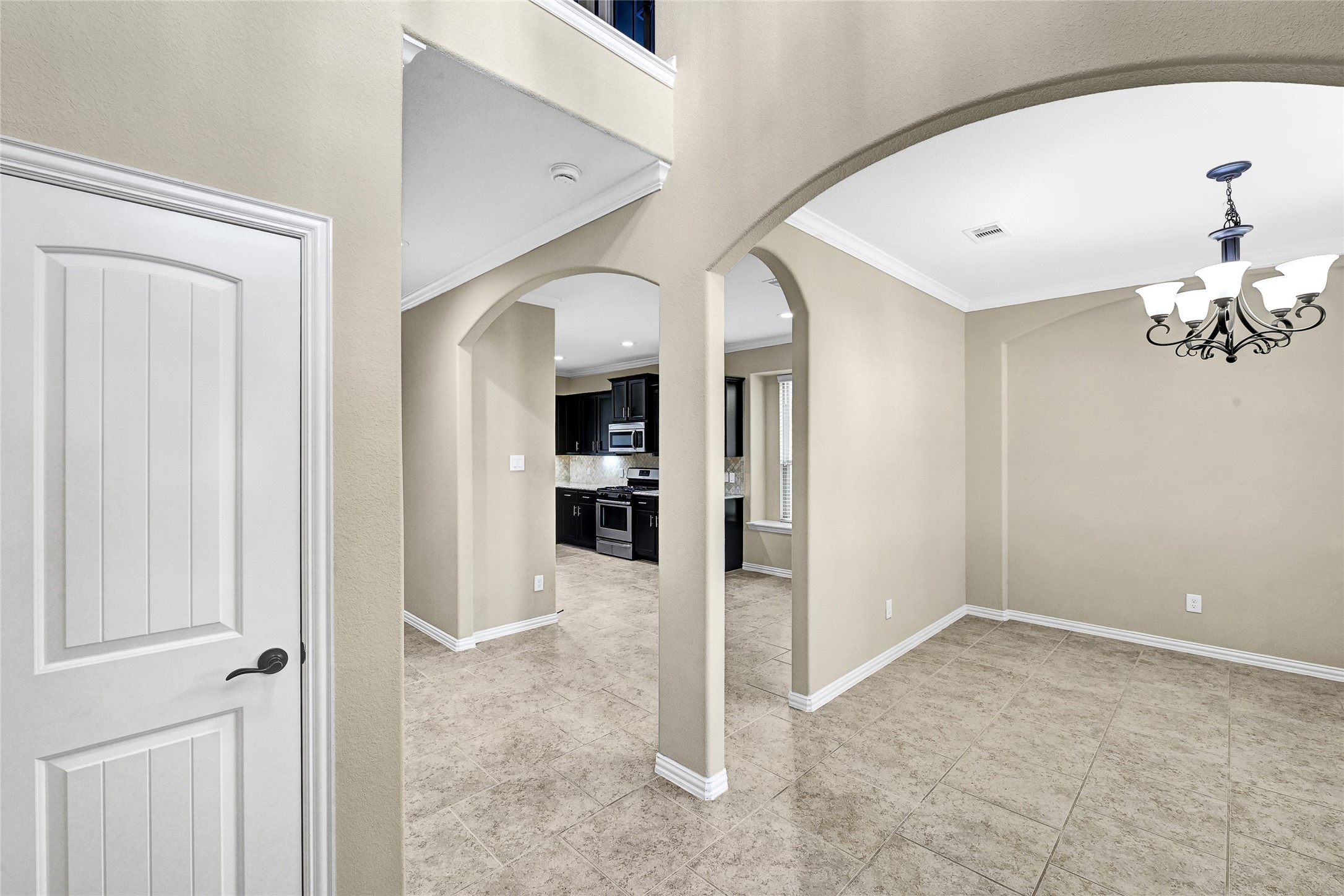 31796 Chapel Rock Lane Spring, TX 77386 - Photo 5 of 30 a view of a hallway with a dining table