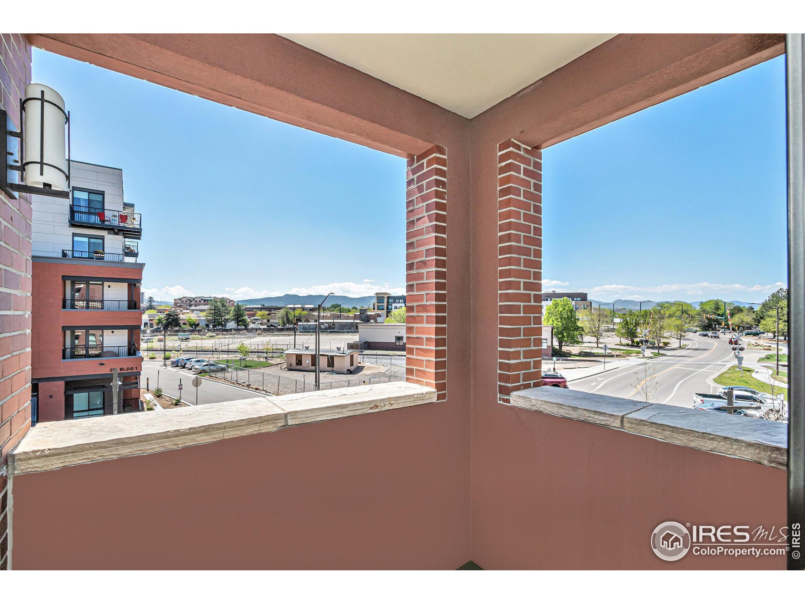 220 Willow Street, Unit 301 Fort Collins, CO 80524 - Photo 7 of 27 a view of a city from a terrace