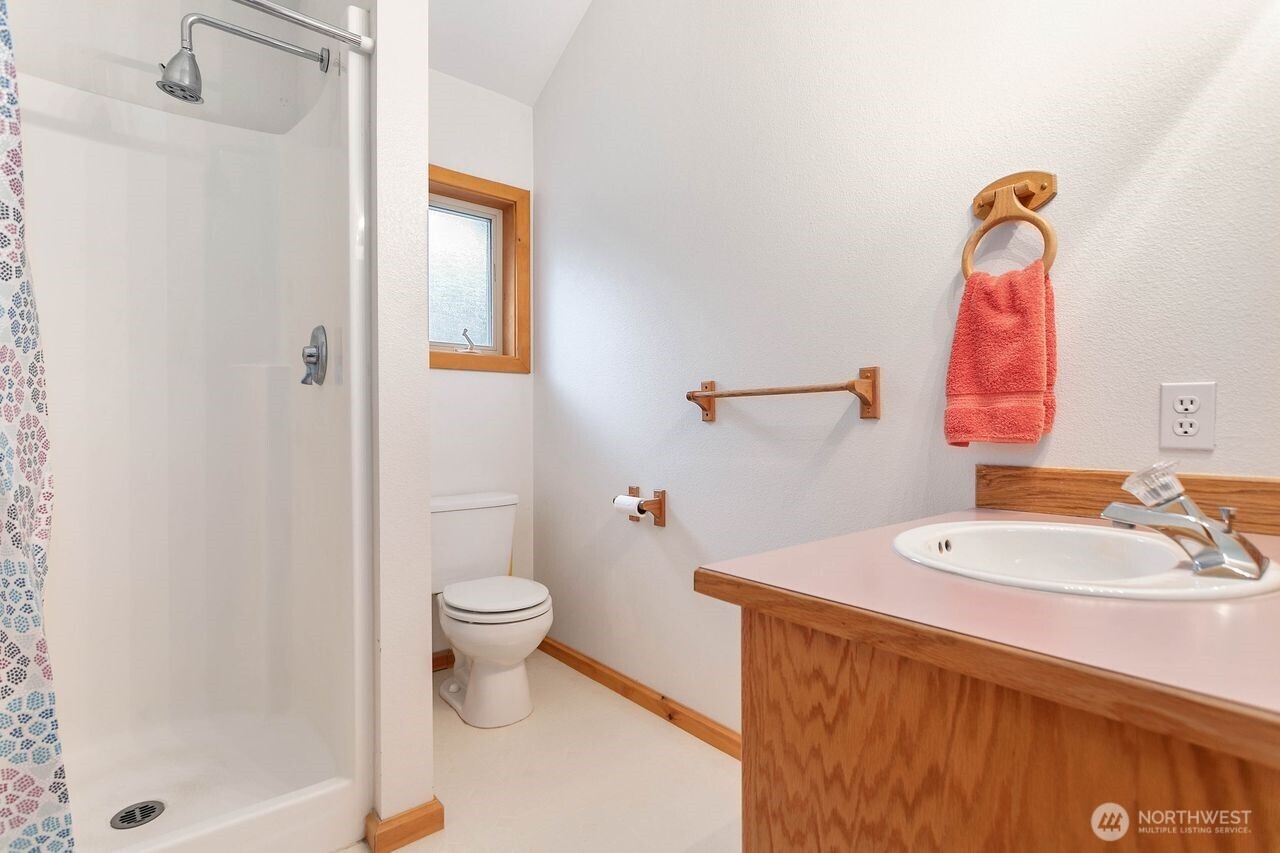 7132 St Helen's Place Deming, WA 98244 - Photo 20 of 35 a bathroom with a sink and a mirror