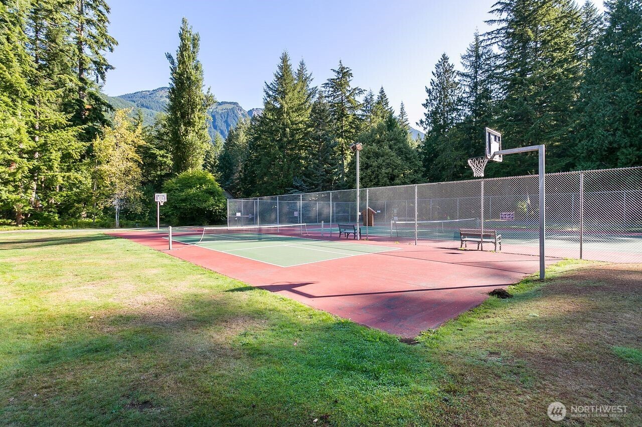 7132 St Helen's Place Deming, WA 98244 - Photo 33 of 35 a view of a swimming pool with a yard