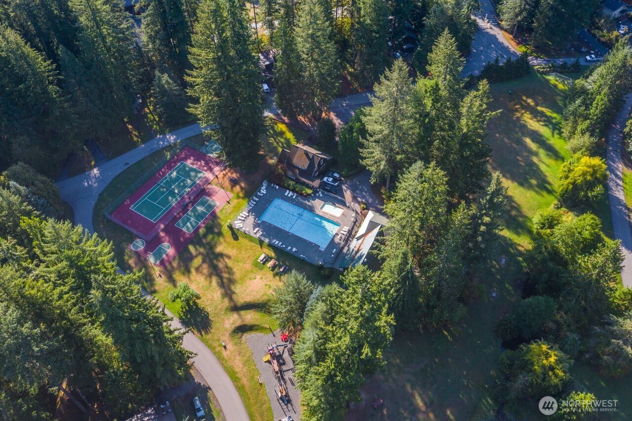 7132 St Helen's Place Deming, WA 98244 - Photo 35 of 35 an aerial view of a house swimming pool a yard and mountain view