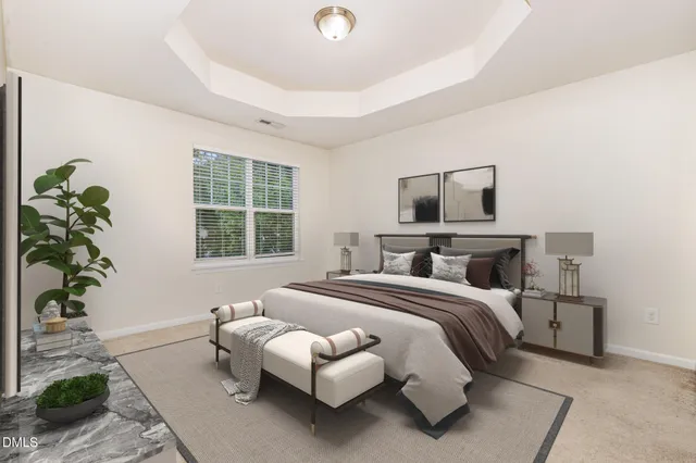 a bedroom with bed and a window