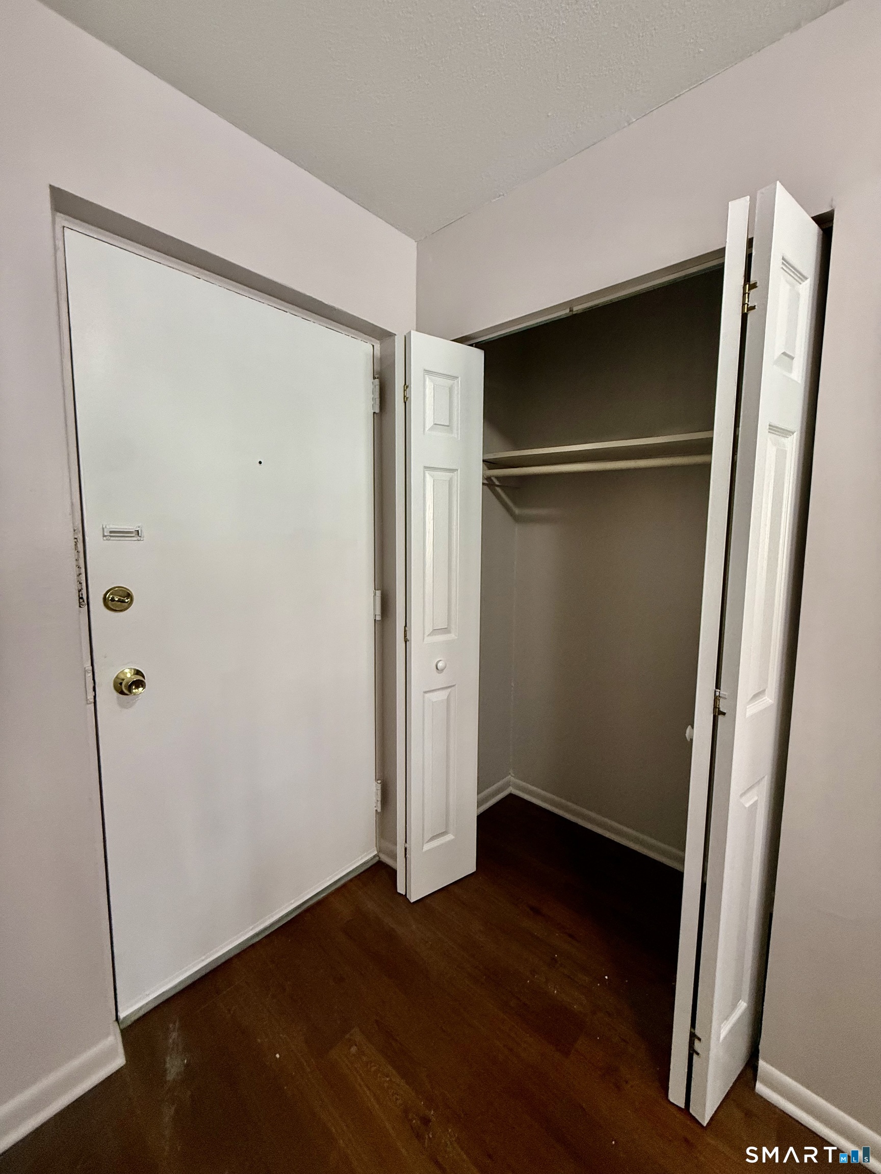 2580 Main Street, Unit A2 Stratford, CT 06615 - Photo 11 of 12 Front door with coat closet.