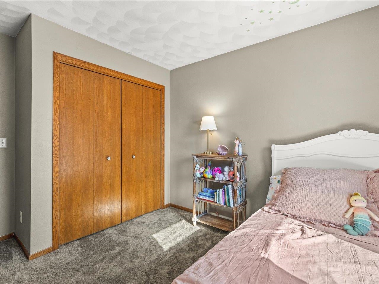 8629 Perth Lane Caledonia, IL 61011 - Photo 34 of 50 a bedroom with a bed and a window