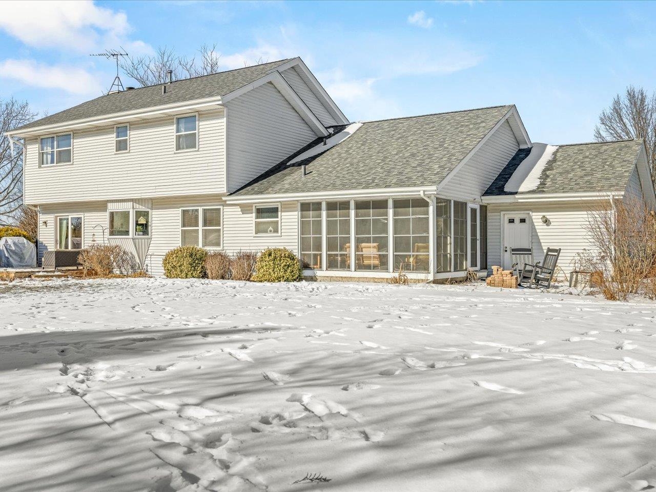 8629 Perth Lane Caledonia, IL 61011 - Photo 47 of 50 a front view of a house with a garden