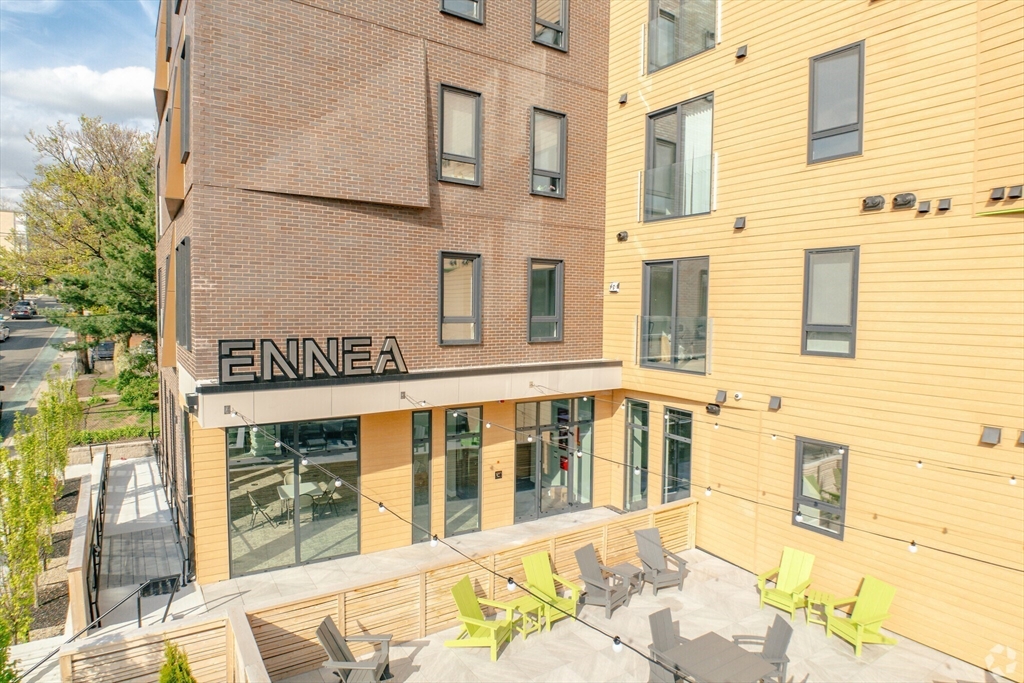 a front view of a building with a street