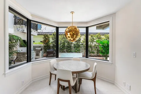 a room with a sink and a mirror