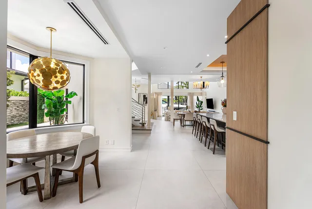 a bedroom with furniture and flat screen tv